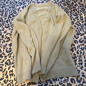 green knitted cardigan